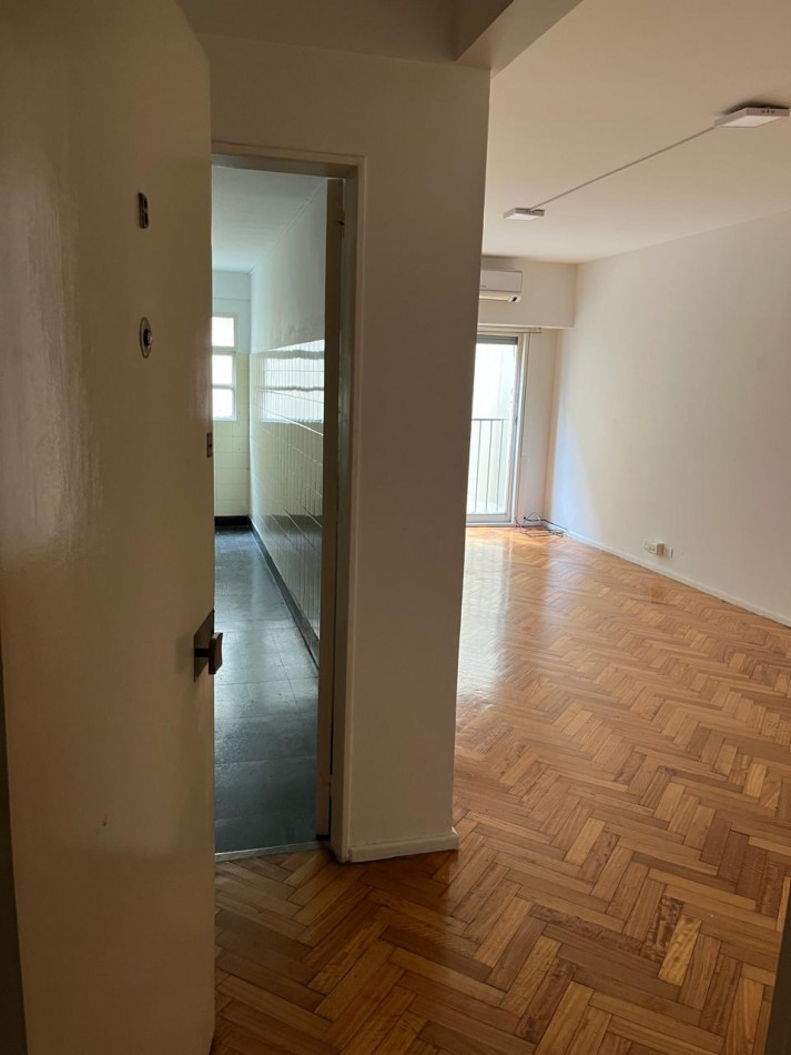 2 ambientes grandes en edificio torre, luminoso,  seguridad 24 hs.-