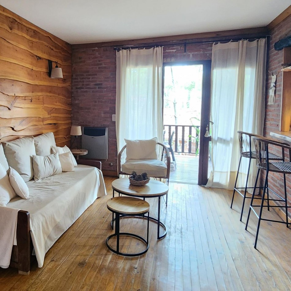 Hermosa cabaña en Carilo en complejo con amenities.