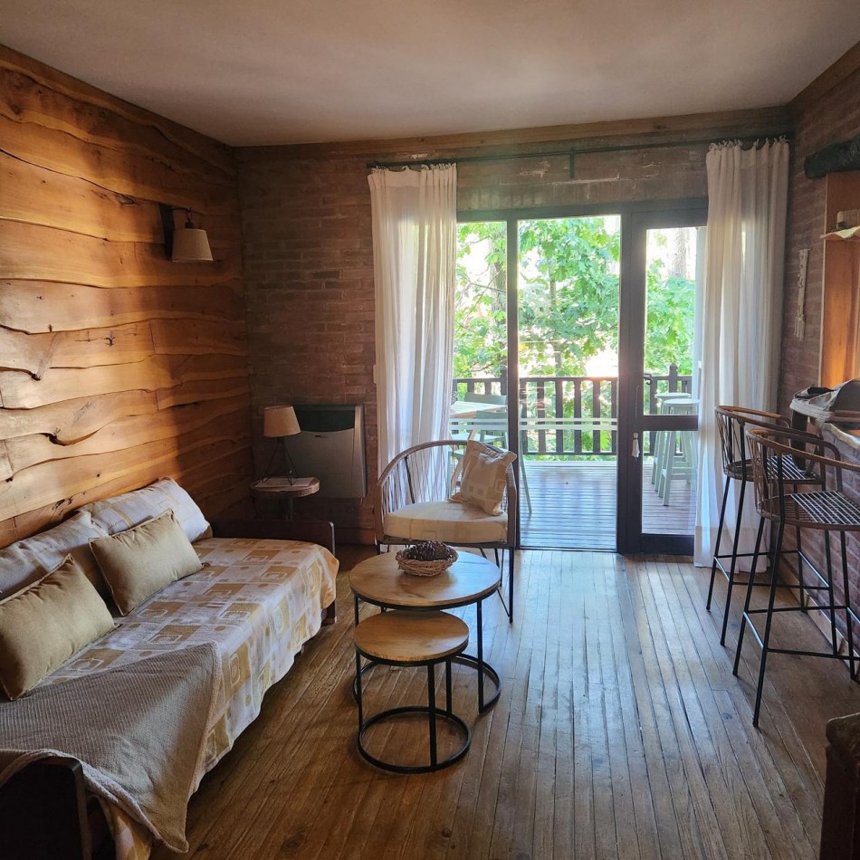 Hermosa cabaña en Carilo en complejo con amenities.