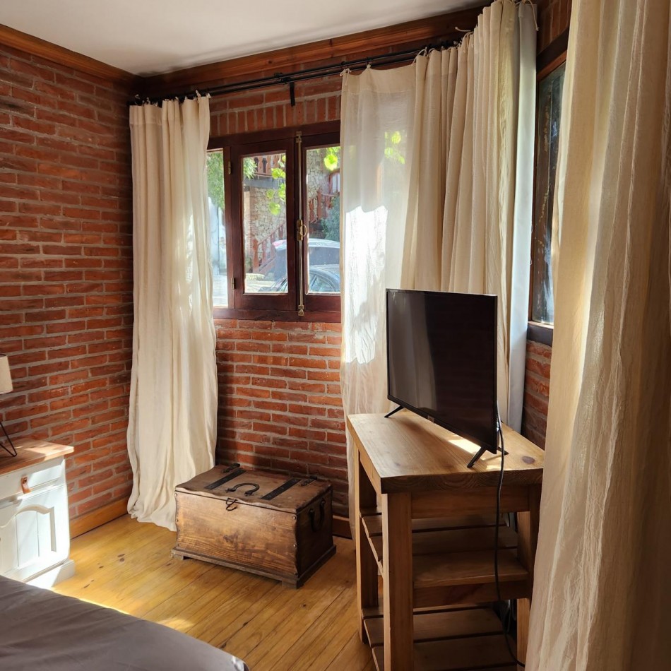 Hermosa cabaña en Carilo en complejo con amenities.